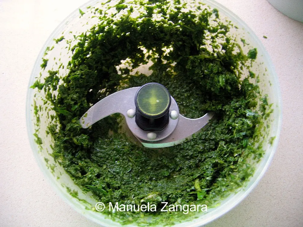 Blended mint paste in a food processor.