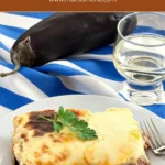 A plated slice of baked moussaka with a golden cheese top and parsley garnish.