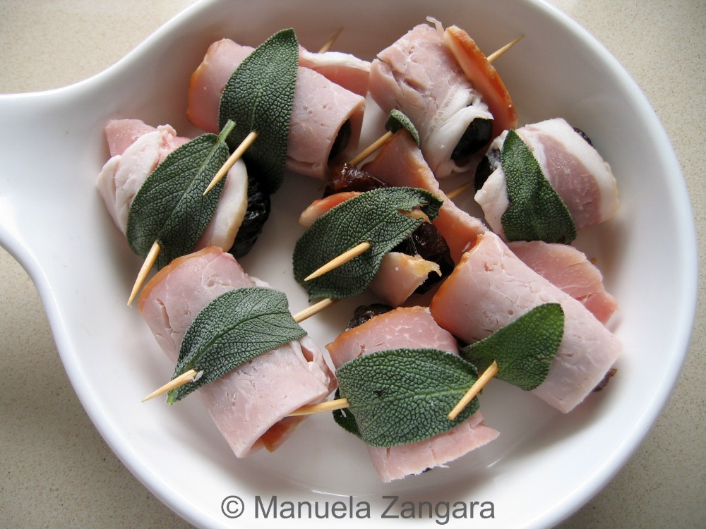Warm baked prunes wrapped in crunchy bacon and sage