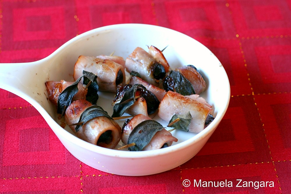 Warm baked prunes wrapped in crunchy bacon and sage