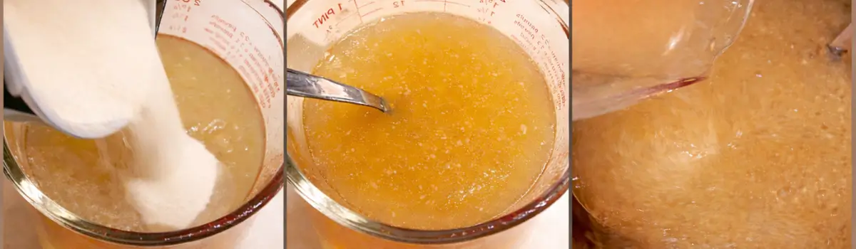 Gelatine powder added to warm chicken stock and stirred until dissolved.