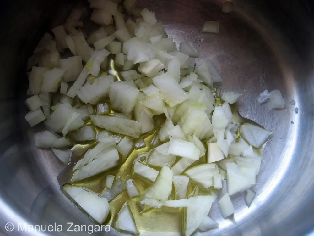 Chopped onions cooking gently in olive oil.