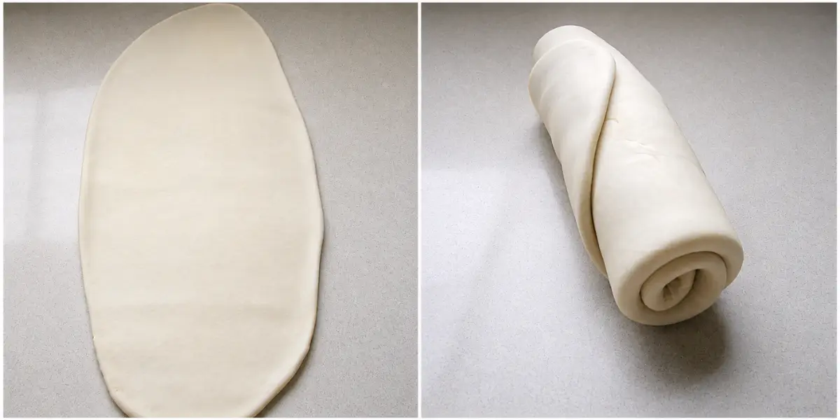 Dough sheet rolled out and shaped into a tight pastry log.