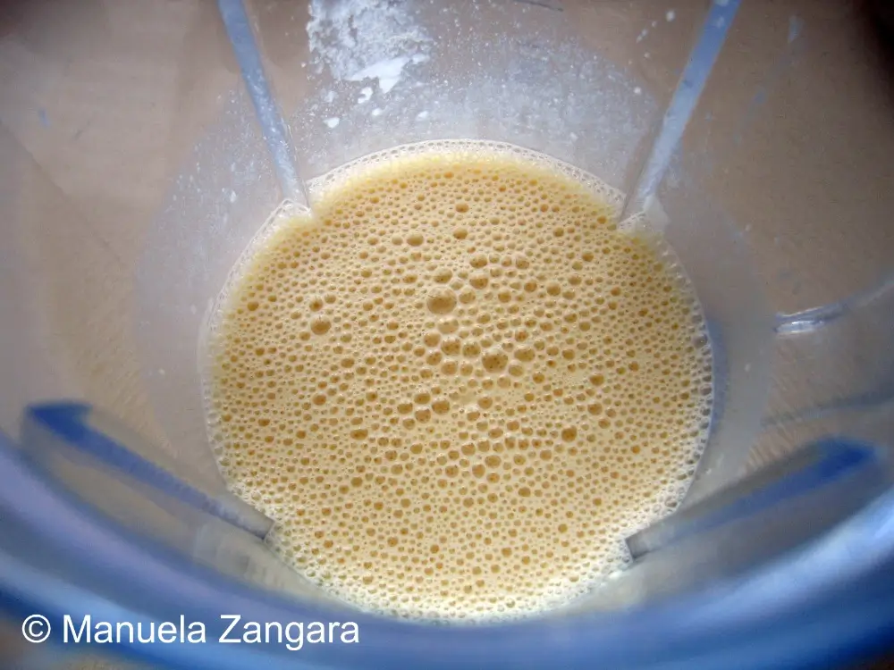Blended egg batter inside a blender jug.