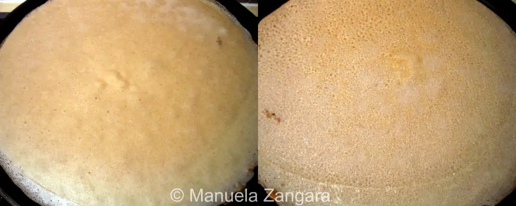 Buckwheat galette cooking in a pan as the surface dries and sets.