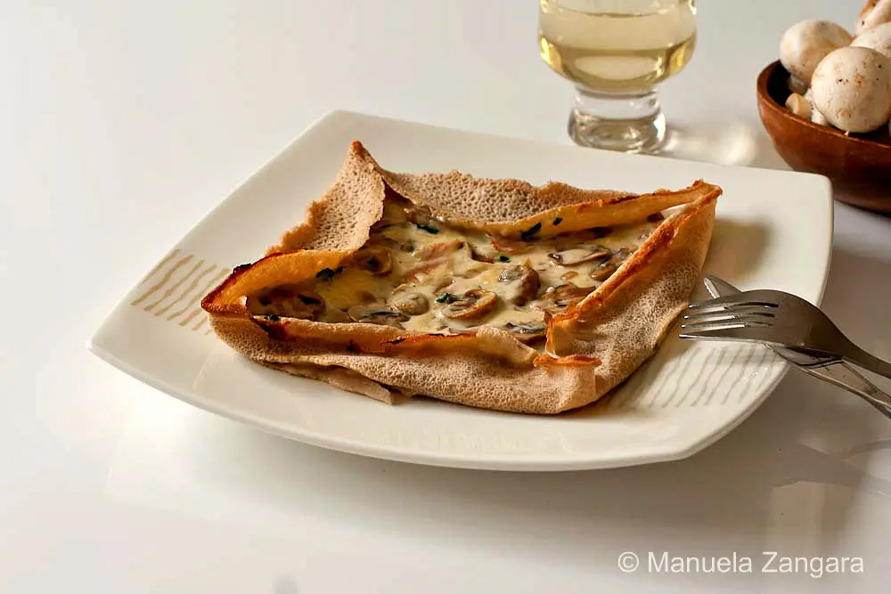 Folded buckwheat galette baked with creamy mushroom filling.