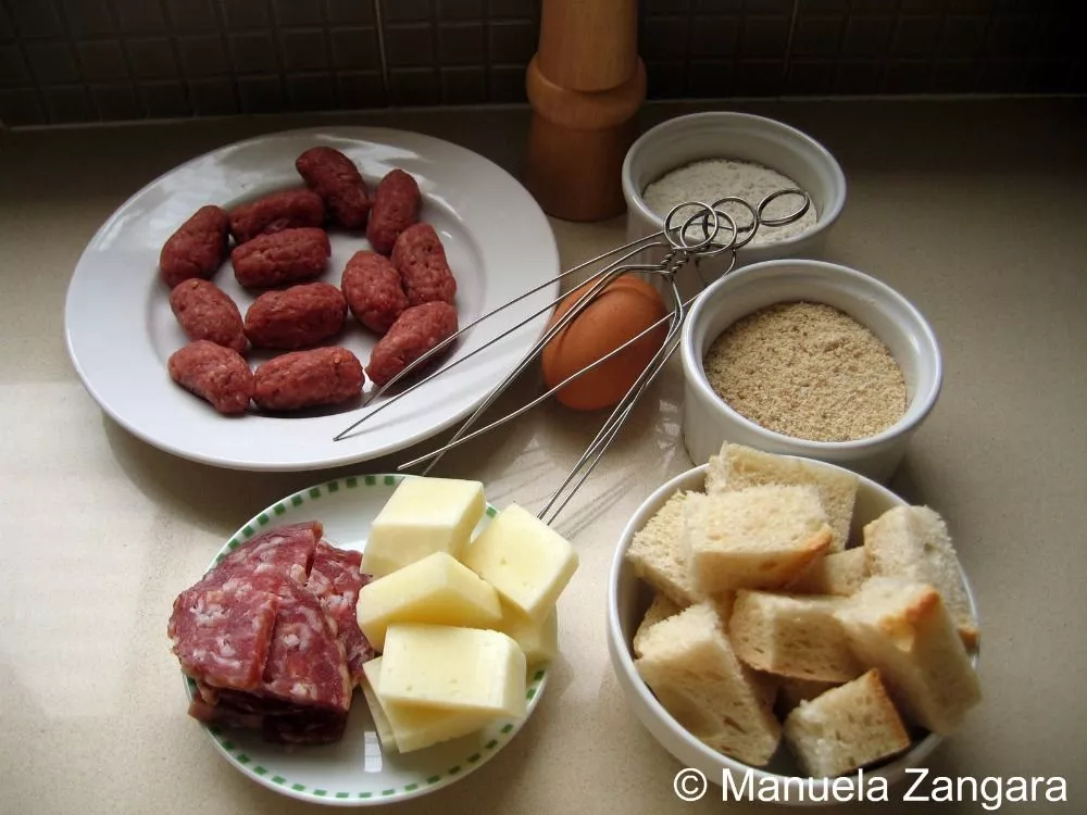 Ingredients for Sicilian meatball spiedini arranged on the counter.