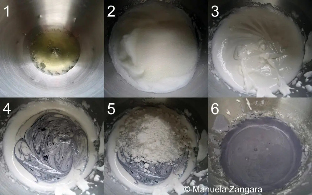 Sequence of whipping egg white, adding sugar, vodka, icing sugar, and black colouring until thick icing forms.
