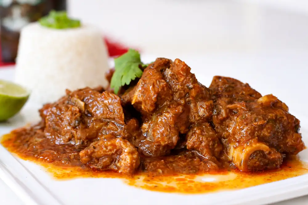 Tender goat meat in a thick, rich sauce.