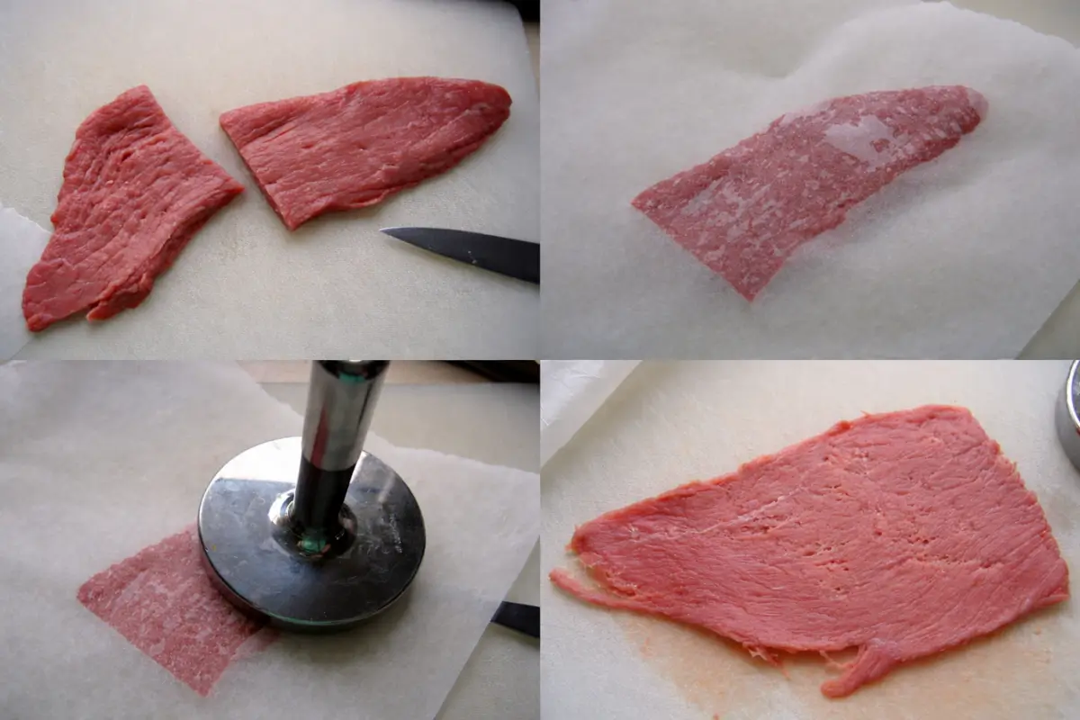 Veal being sliced, pounded flat, and prepared into thin schnitzels.