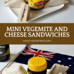 Vegemite and cheese sandwiches served with an Australian flag and a bottle of beer in the background.