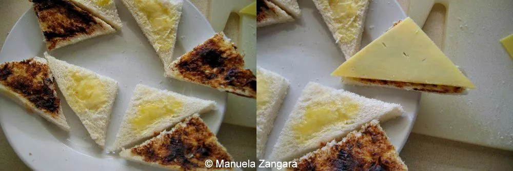 Post164 Bread slices on a plate spread with butter and Vegemite, with cheese triangles.