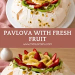 Pavlova topped with cream, strawberries, kiwi and passion fruit.