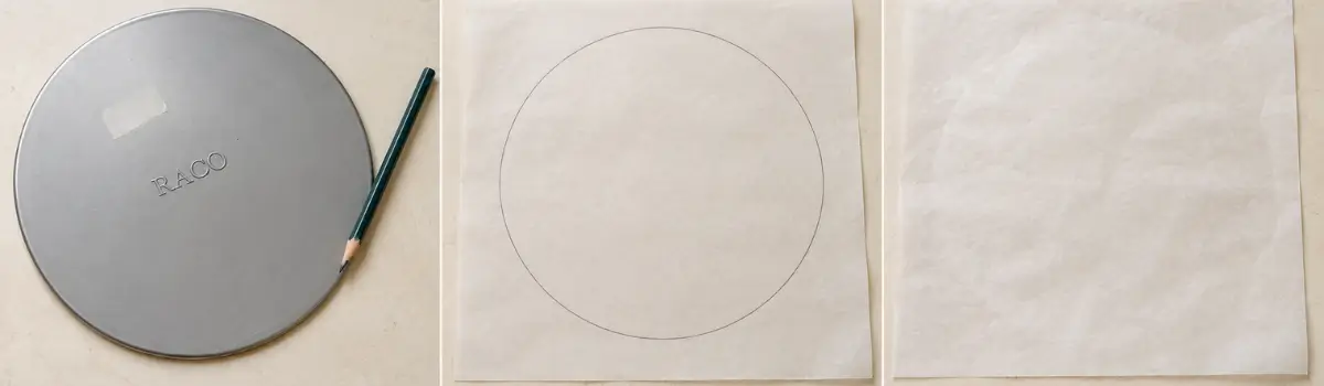 A 20 cm disc traced onto baking paper and turned ink-side down.
