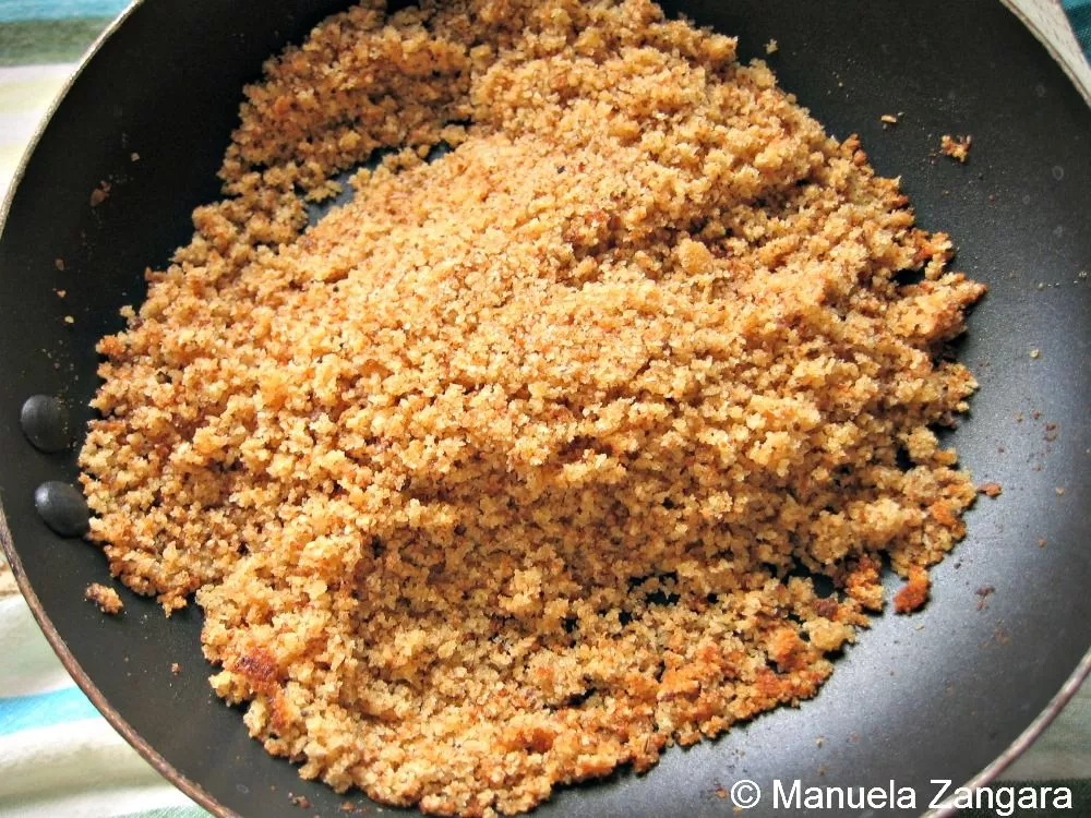 Golden breadcrumb mixture toasted in butter for Apfelstrudel filling.