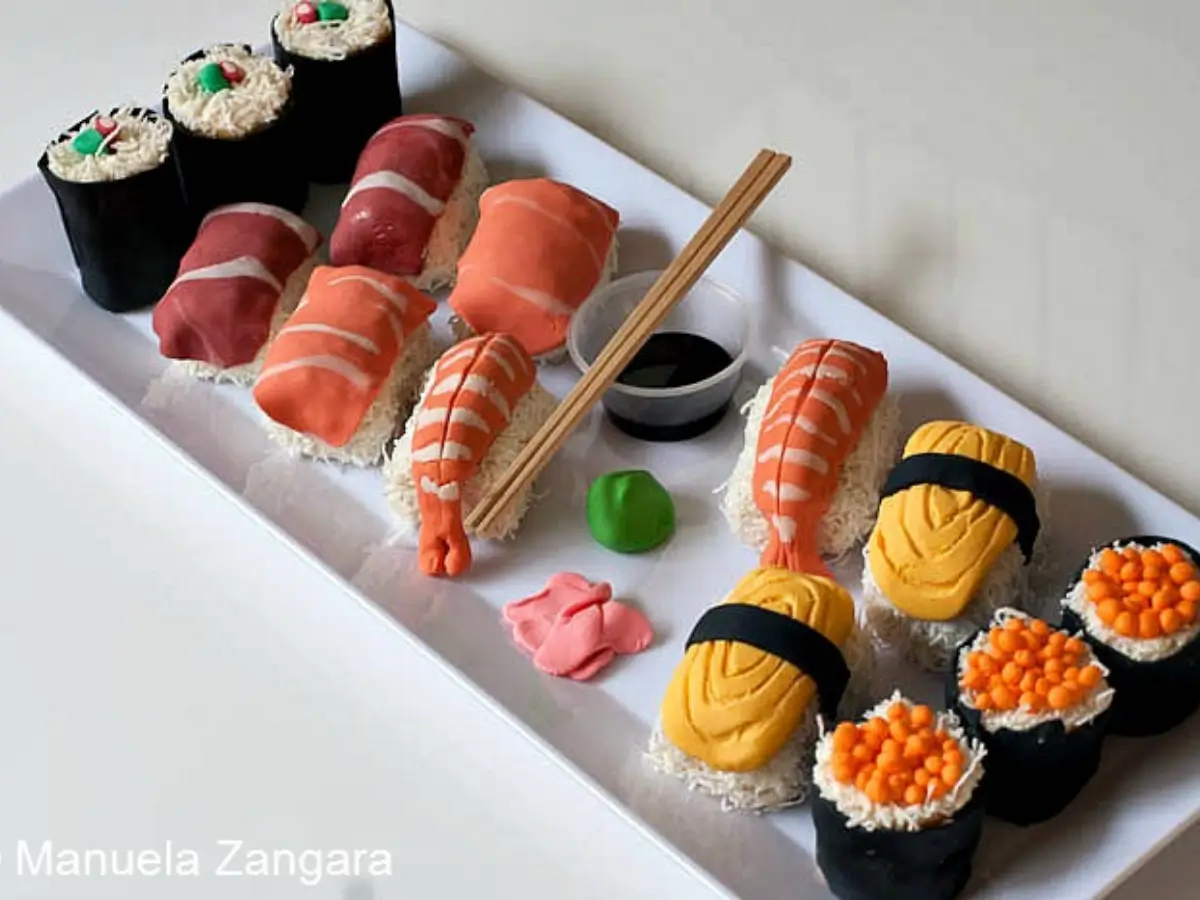 Sweet Sushi Close-up of sweet sushi with fondant toppings and coconut rice.