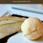 Parmigiano Reggiano Gelato served with sliced pear and balsamic drizzle.