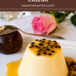 Passion Fruit Panna Cotta with Vanilla Cream served with glossy passion fruit coulis on a white plate.