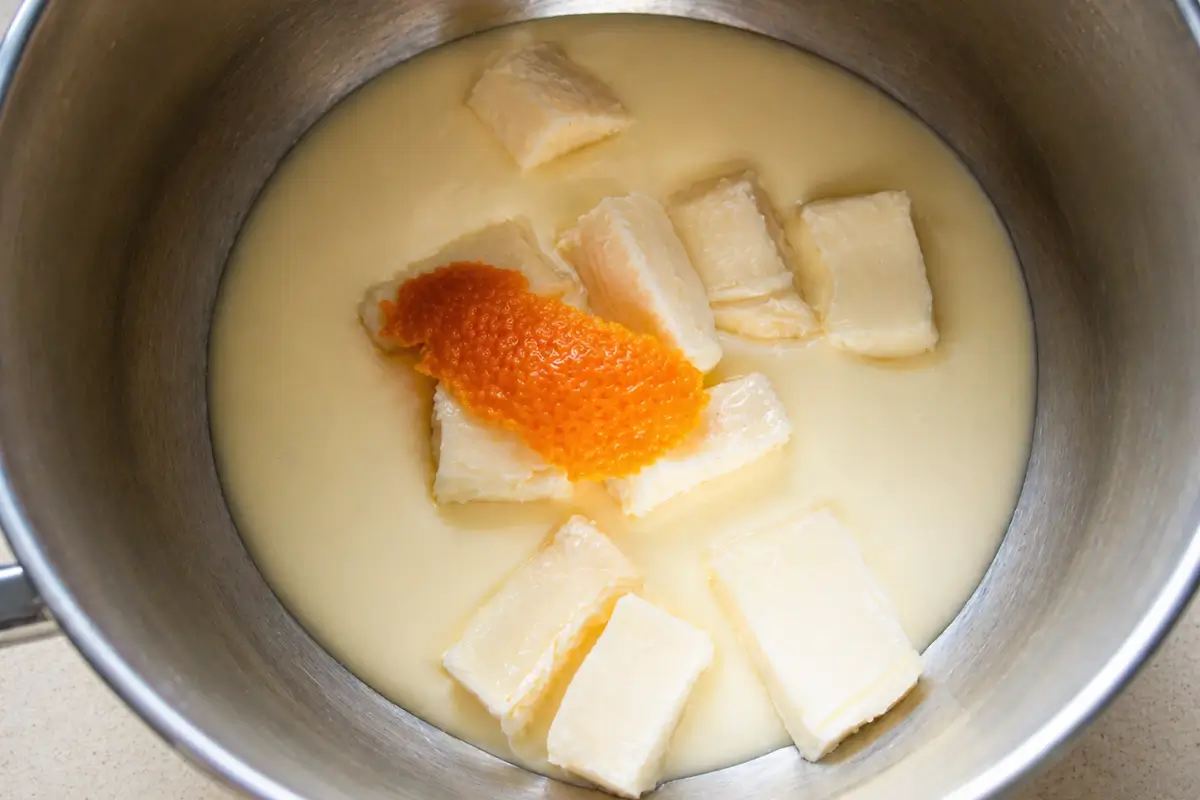 Taleggio cheese, cream, and orange peel prepared for the taleggio fondue.