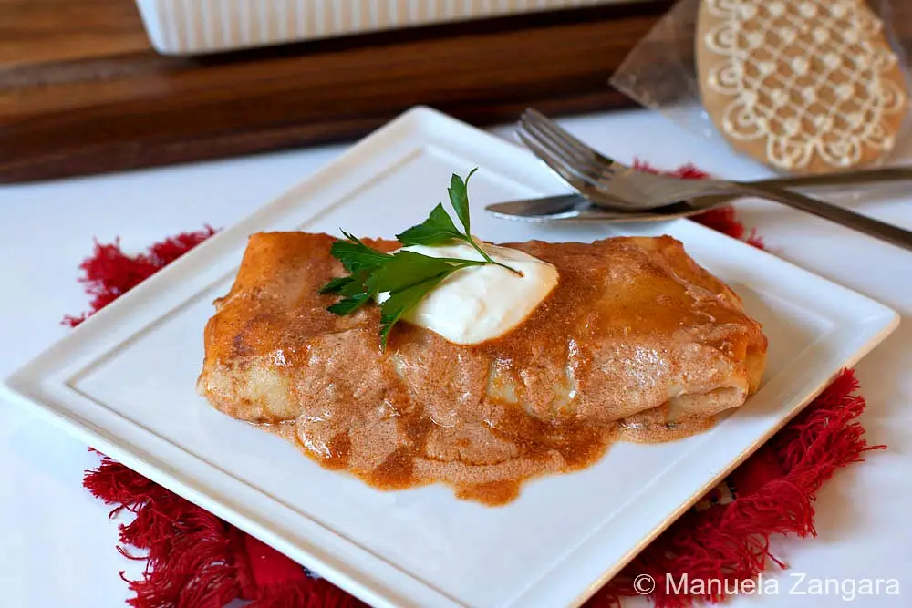 2 Hortobagy Palacsinta 4 (1 of 1) Stack of cooked crêpes on a plate.