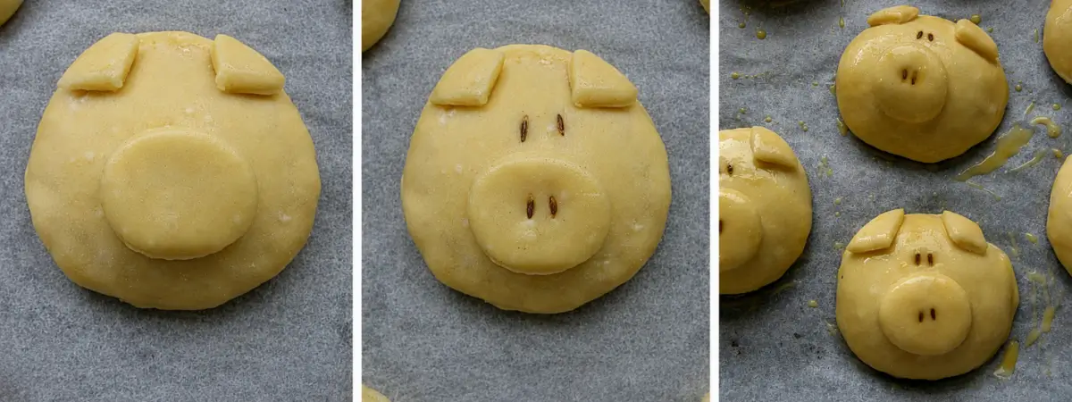 Piggy buns with dough ears, round snouts and cumin seed eyes and nostrils.