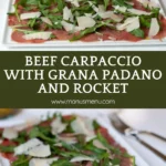 Thin slices of raw beef topped with baby rocket and Grana Padano shavings on a serving plate.