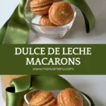 Close-up of Dulce de Leche macarons with gold dust in a glass bowl tied with a green ribbon.
