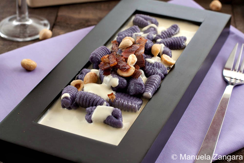 Purple Gnocchi on a Parmigiano Reggiano Fondue, Toasted Hazelnuts and Crunchy Speck