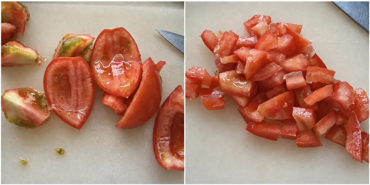 Seeded tomatoes chopped into small pieces on a cutting board.