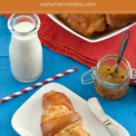 Freshly baked croissants with golden crust and flaky layers