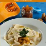 Close-up of Tortelli di Zucca with soft pumpkin filling and melted butter.