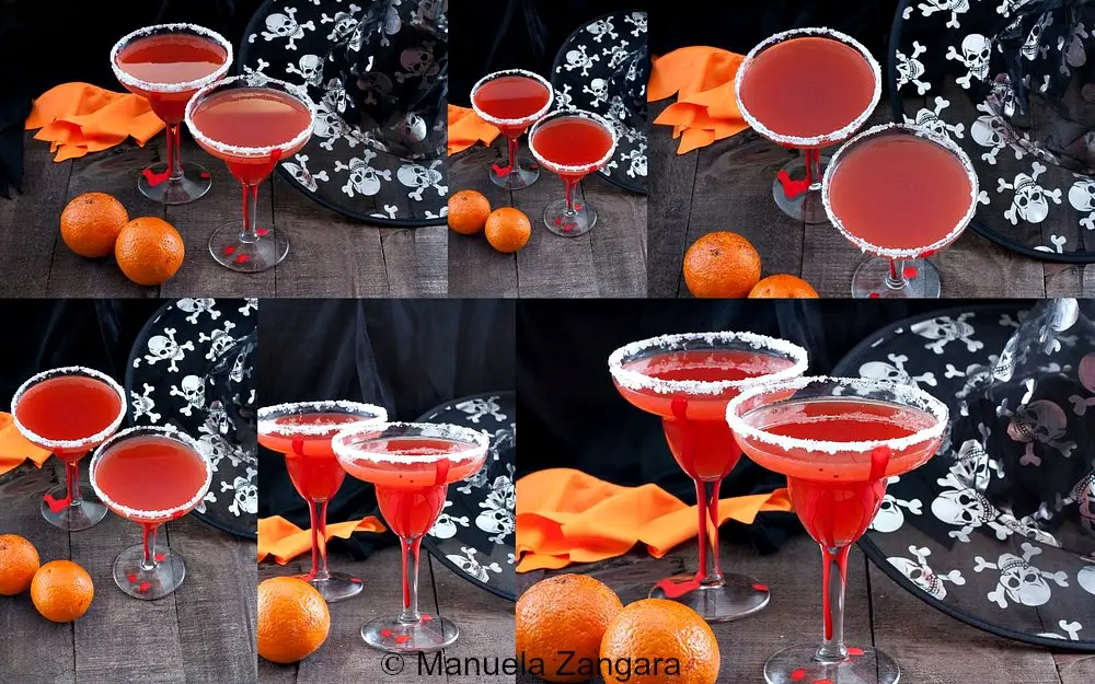 Multiple Blood Orange Margaritas styled with oranges and Halloween props.