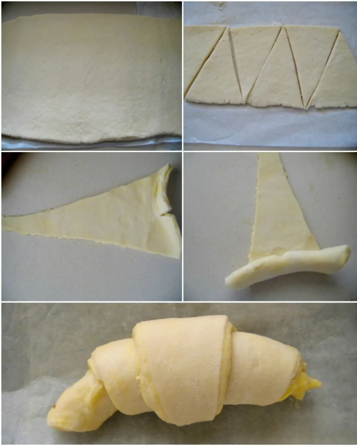 Rolling croissant dough triangles into classic crescent shapes.