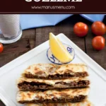 Golden, pan-cooked flatbread parcels served with lemon and cherry tomatoes.