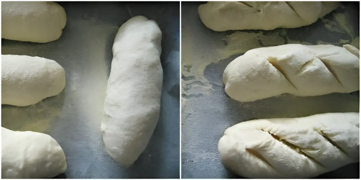 Shaped dough rolls on a tray, lightly floured and scored before baking.