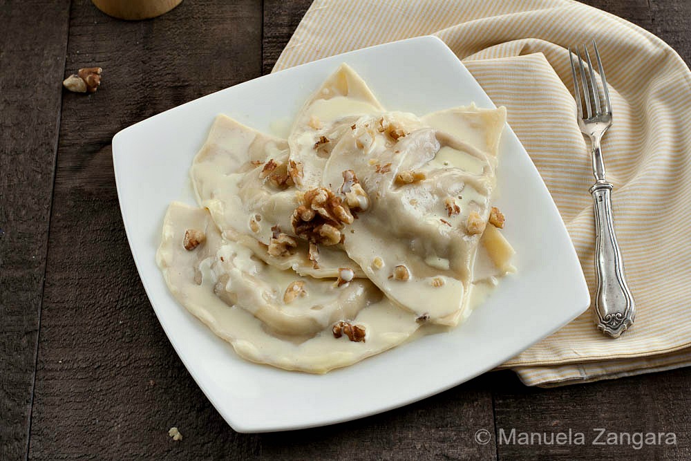 Taleggio and Walnut Mezzelune with Parmigiano Reggiano Fondue