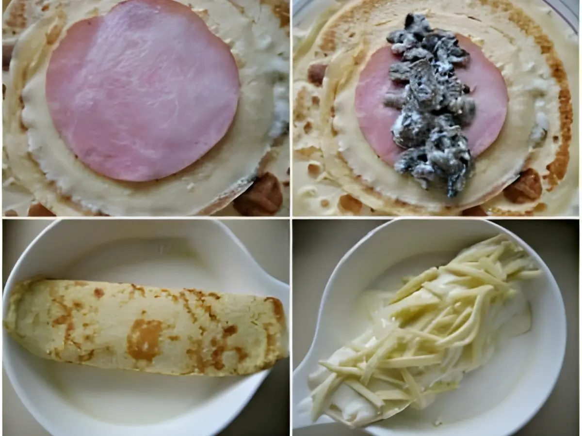 Ham placed on crêpes, filled, rolled, and topped with béchamel and cheese.