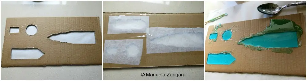 Cardboard moulds lined for casting blue sugar panels for the castle.