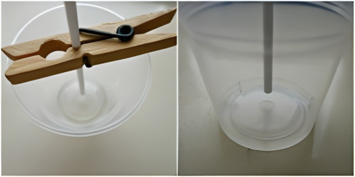 Lollipop stick positioned upright in a clear plastic cup before adding syrup.