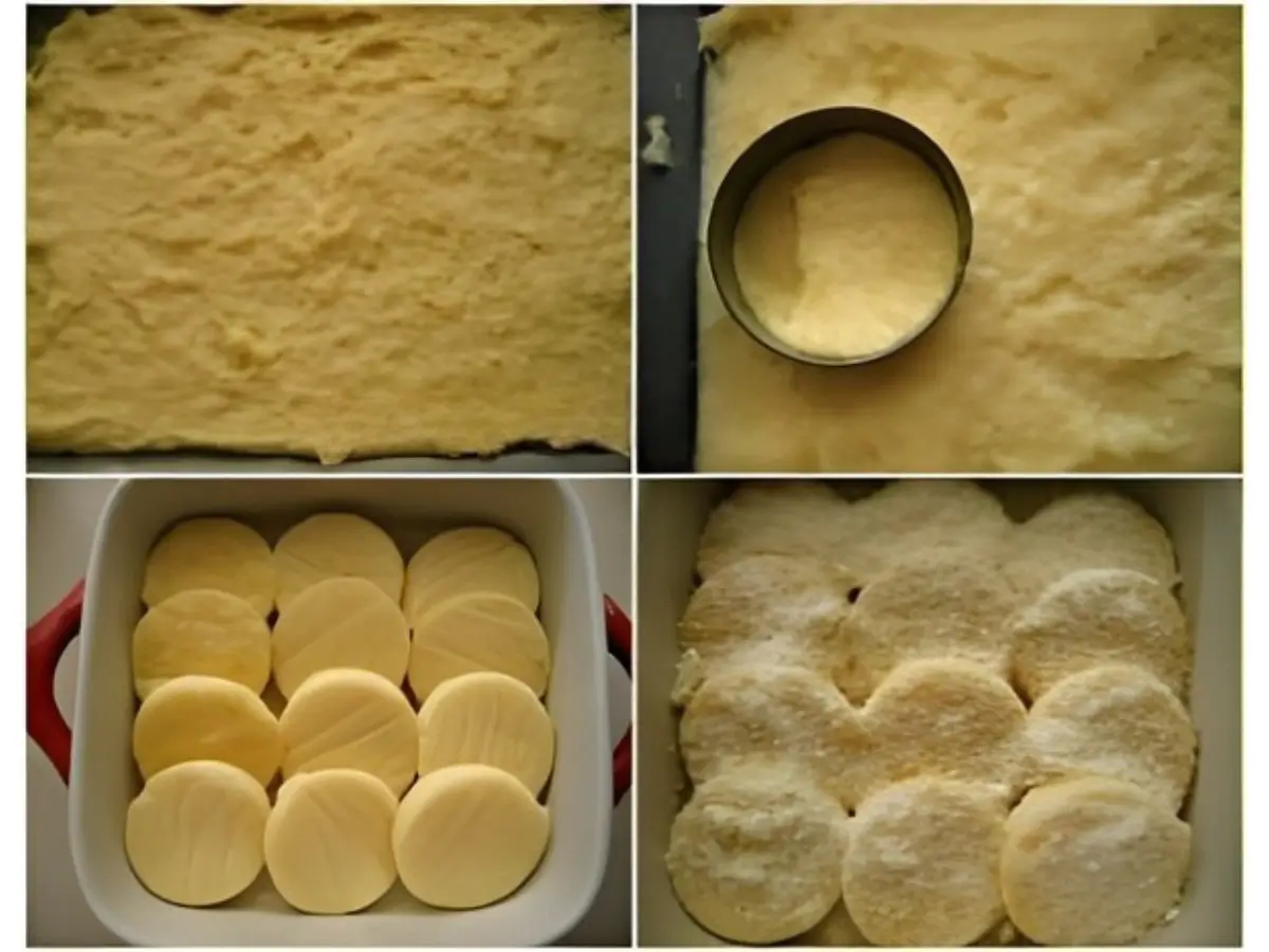 Semolina mixture spread on a tray, cut into rounds, and arranged in a baking dish.