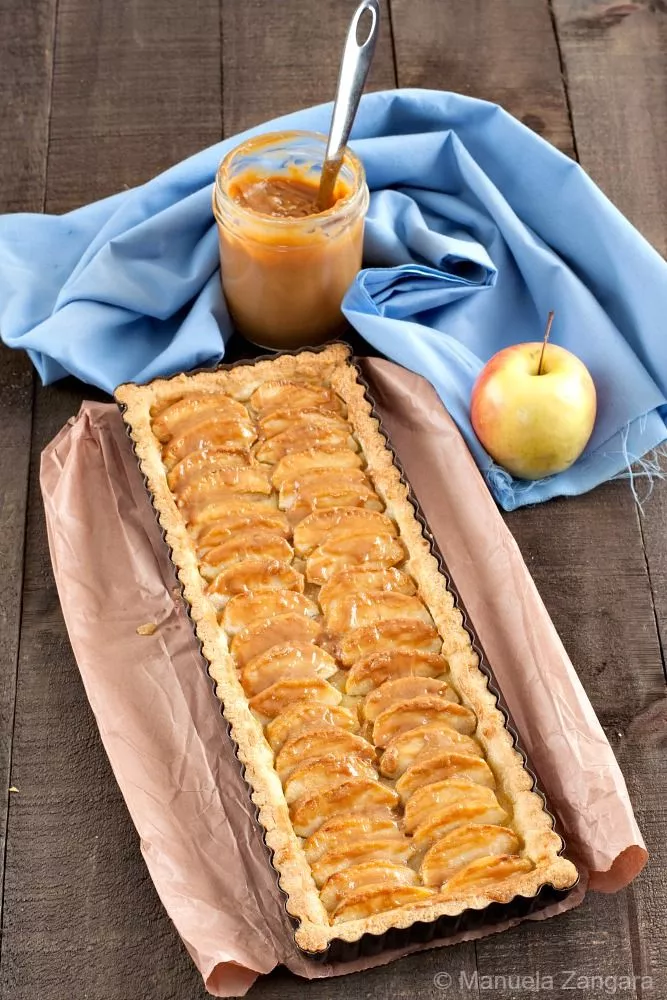 Overhead shot of the full Apple and Dulce de Leche Tart showing its glossy caramel finish.