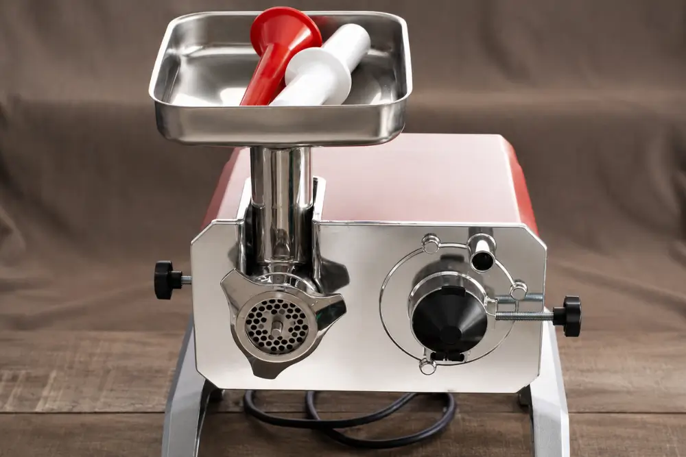 Toollio sausage filler and meat grinder attachment used for homemade pork sausages.