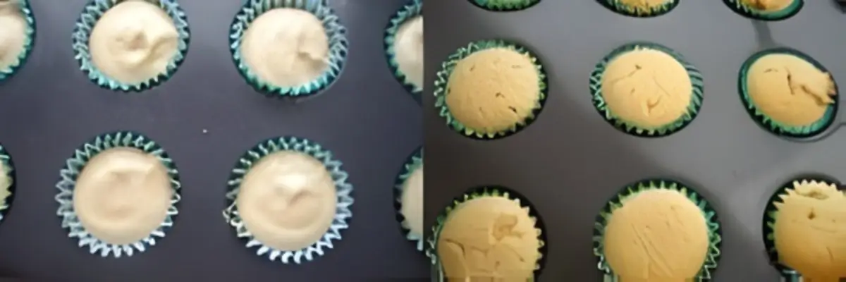 Vanilla cupcake batter spooned into muffin liners.