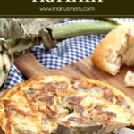 Fresh artichokes and rustic bread on a cutting board.