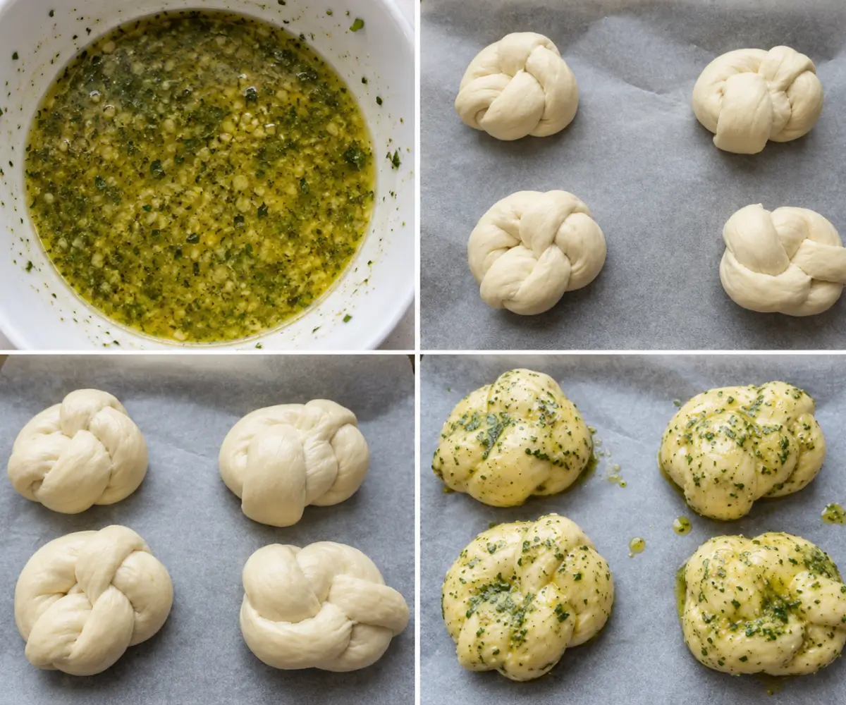 Garlic herb butter brushed over unbaked dough knots on a parchment-lined baking sheet.
