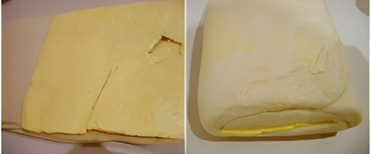 Second butter packet enclosed in the dough during lamination.
