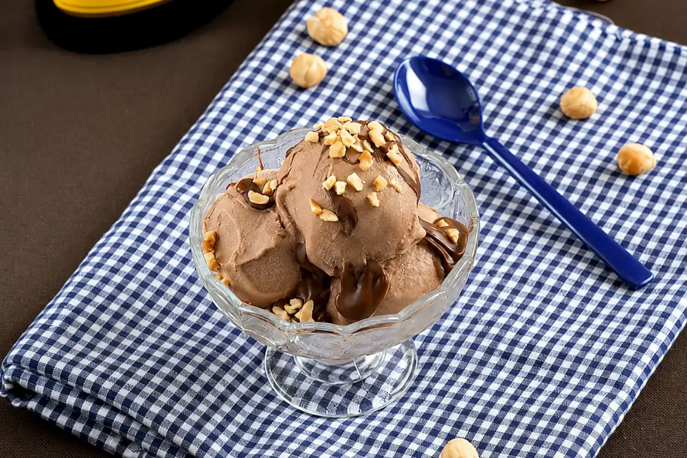 Chocolate hazelnut gelato topped with warm Nutella and toasted hazelnuts.