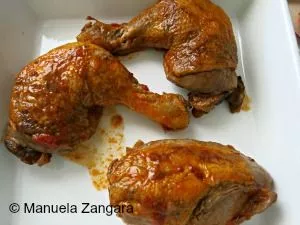 Broiled chicken pieces baked until golden before being added to the Kabsa rice.