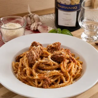 Fresh Troccoli pasta coated in rich pork ragù with tender pieces of slow-simmered pork.