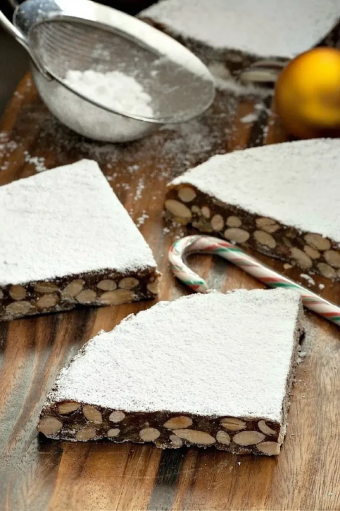 Homemade Italian Panforte from Siena, a spiced fruit cake served at Christmas.